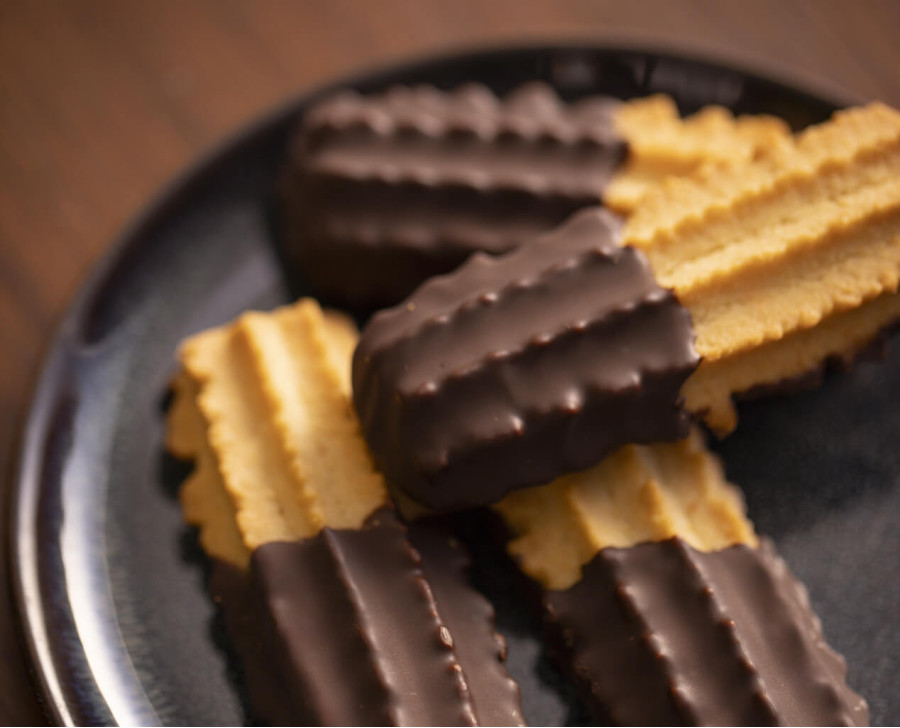 Spritz chocolaté - Biscuit sablé enrobé de chocolat lait